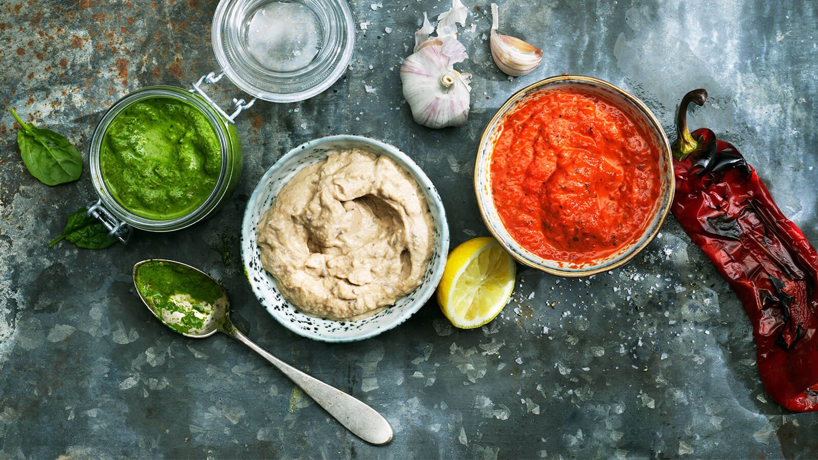 Bowls with three different sauces that goes along well with BBQ