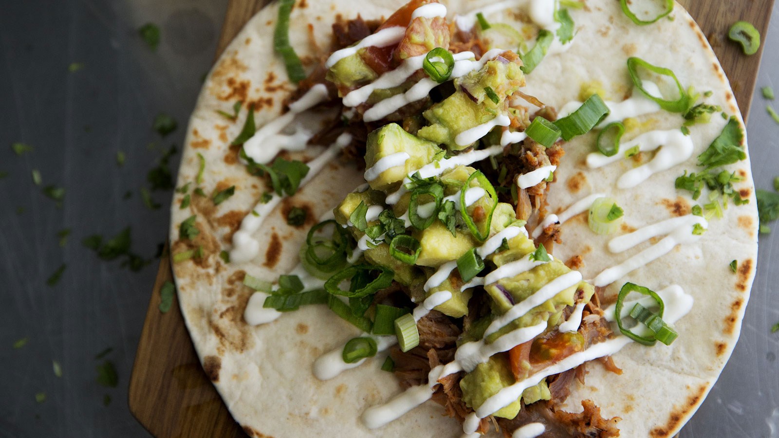 Carnitas – Pulled Pork tortilla’s met guacamole en crème fraîche