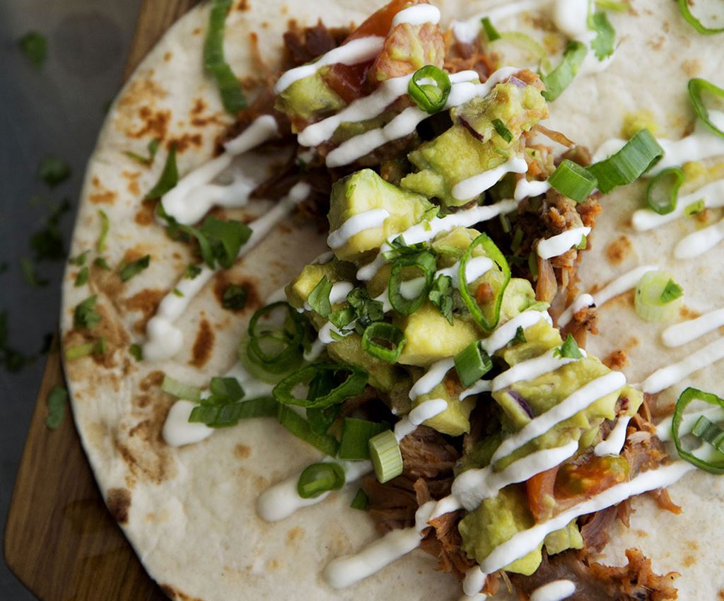 Carnitas – Pulled Pork tortilla’s met guacamole en crème fraîche